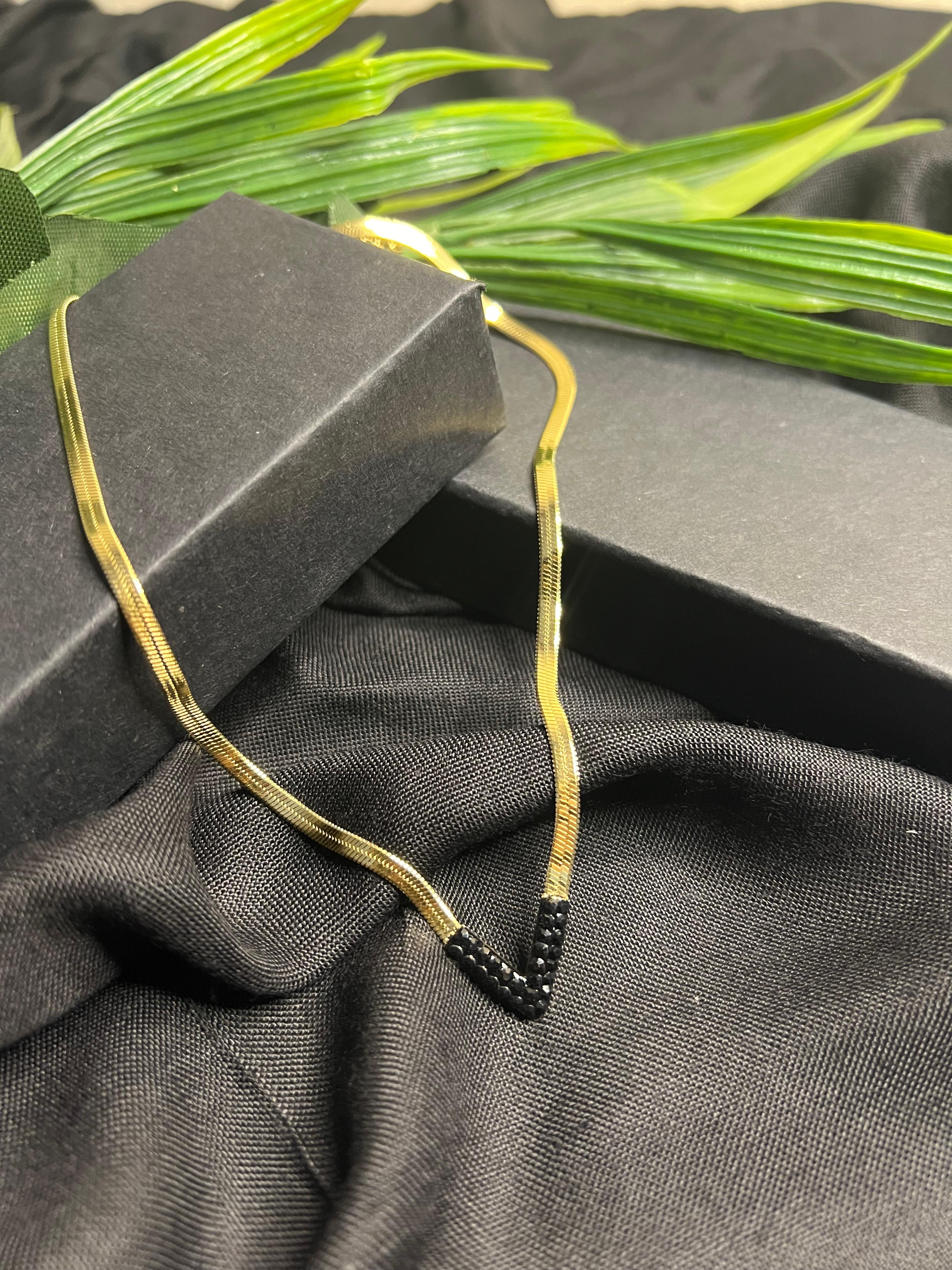 ELEGANT GOLDEN AND BLACK PENDANT